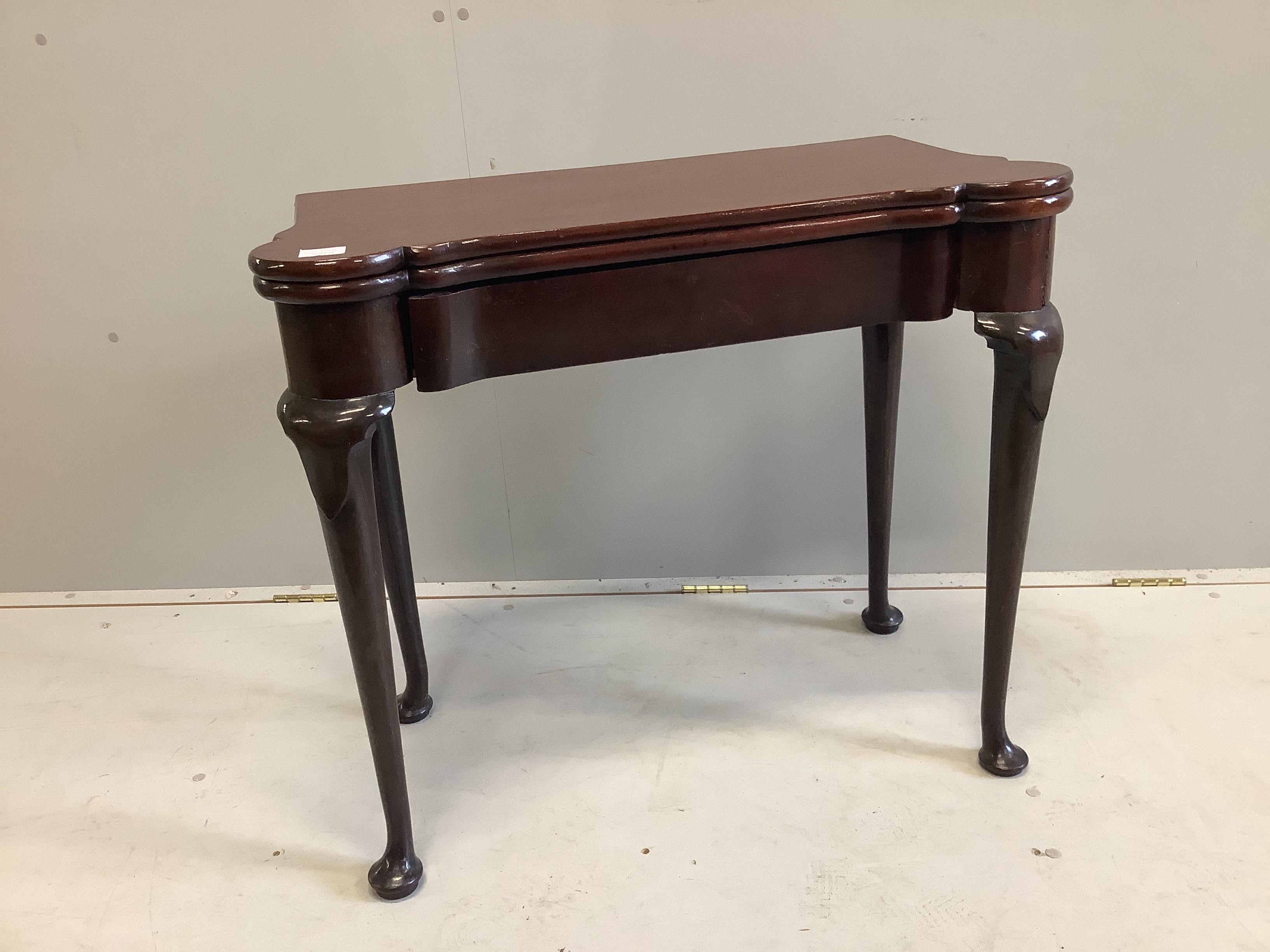 A George II mahogany folding card table, ex Arthur Bryant, width 83cm, depth 40cm, height 72cm